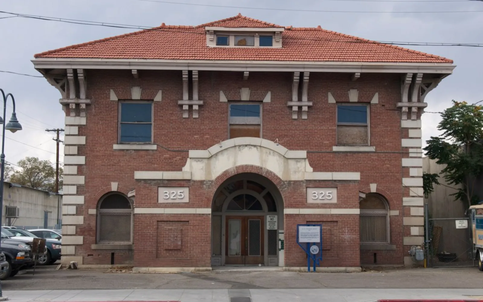 Historic railroad depot building with wooden structure, platform, and period architecture